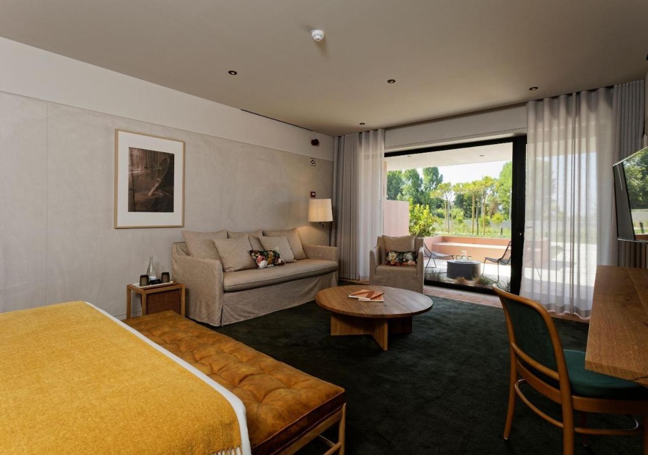 Montebelo Vista Alegre Ilhavo Hotel ภายนอก รูปภาพ A room at the hotel