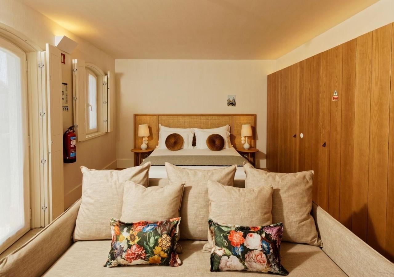 Montebelo Vista Alegre Ilhavo Hotel ภายนอก รูปภาพ A bedroom at the hotel