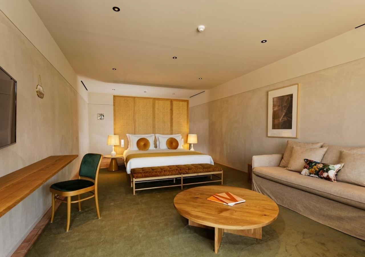 Montebelo Vista Alegre Ilhavo Hotel ภายนอก รูปภาพ A room at the hotel
