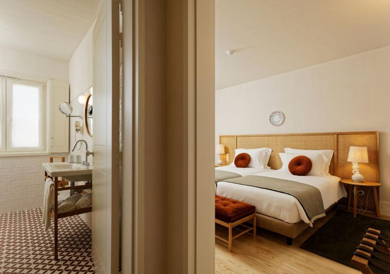 Montebelo Vista Alegre Ilhavo Hotel ภายนอก รูปภาพ A room at the hotel