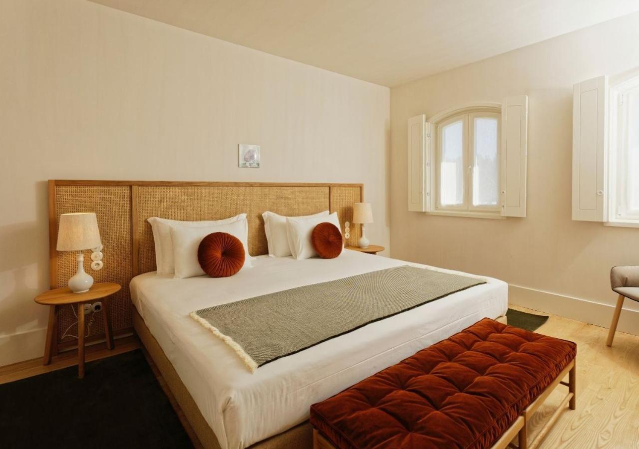 Montebelo Vista Alegre Ilhavo Hotel ภายนอก รูปภาพ A bedroom at the hotel