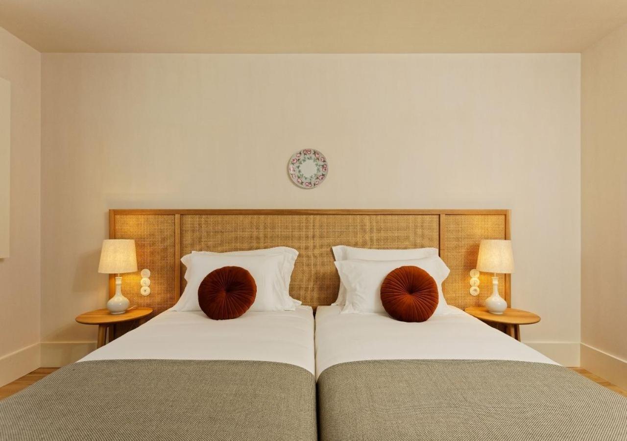 Montebelo Vista Alegre Ilhavo Hotel ภายนอก รูปภาพ A room at the hotel