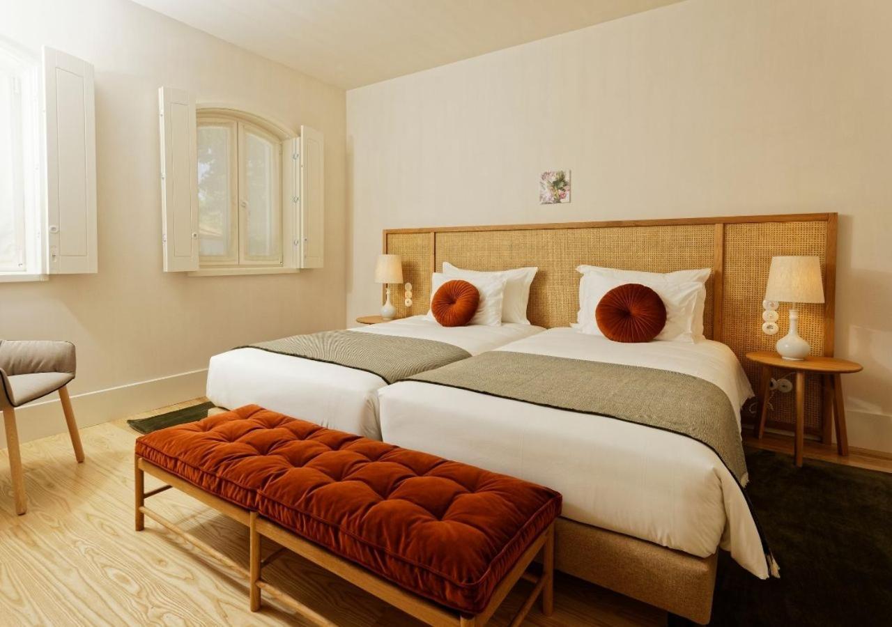 Montebelo Vista Alegre Ilhavo Hotel ภายนอก รูปภาพ A bedroom at the hotel