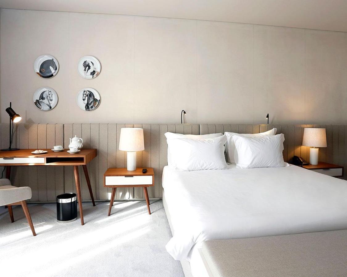 Montebelo Vista Alegre Ilhavo Hotel ภายนอก รูปภาพ A room at the Hotel 57