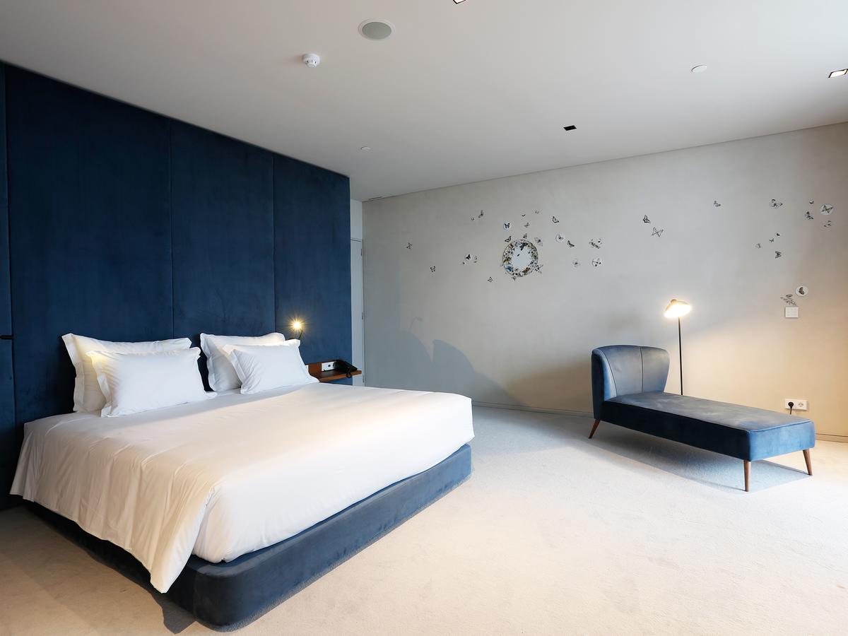 Montebelo Vista Alegre Ilhavo Hotel ภายนอก รูปภาพ A bedroom at the hotel