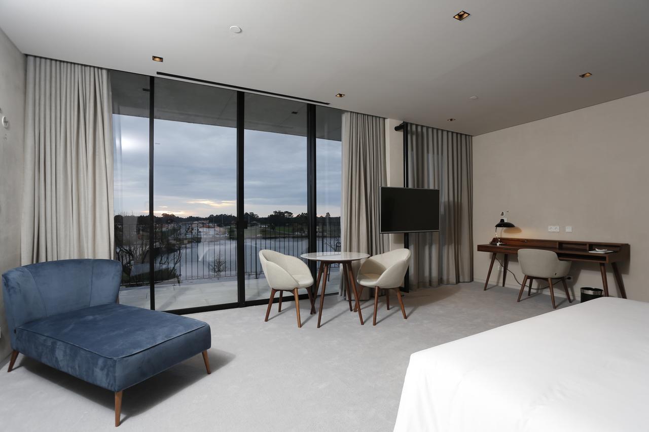 Montebelo Vista Alegre Ilhavo Hotel ภายนอก รูปภาพ A suite at the hotel