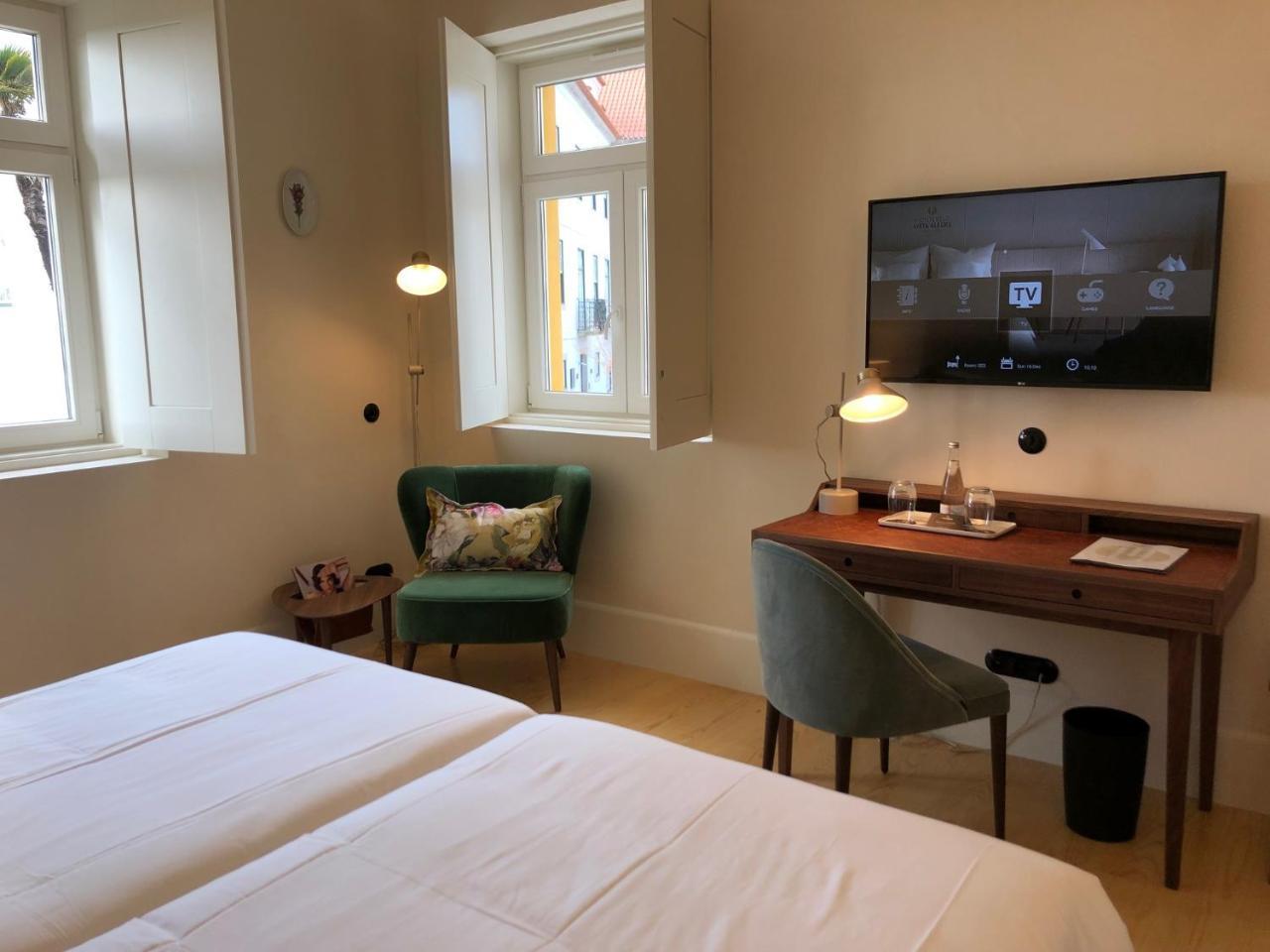 Montebelo Vista Alegre Ilhavo Hotel ภายนอก รูปภาพ A room at the hotel