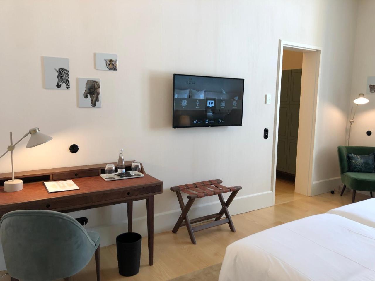 Montebelo Vista Alegre Ilhavo Hotel ภายนอก รูปภาพ A room at the hotel